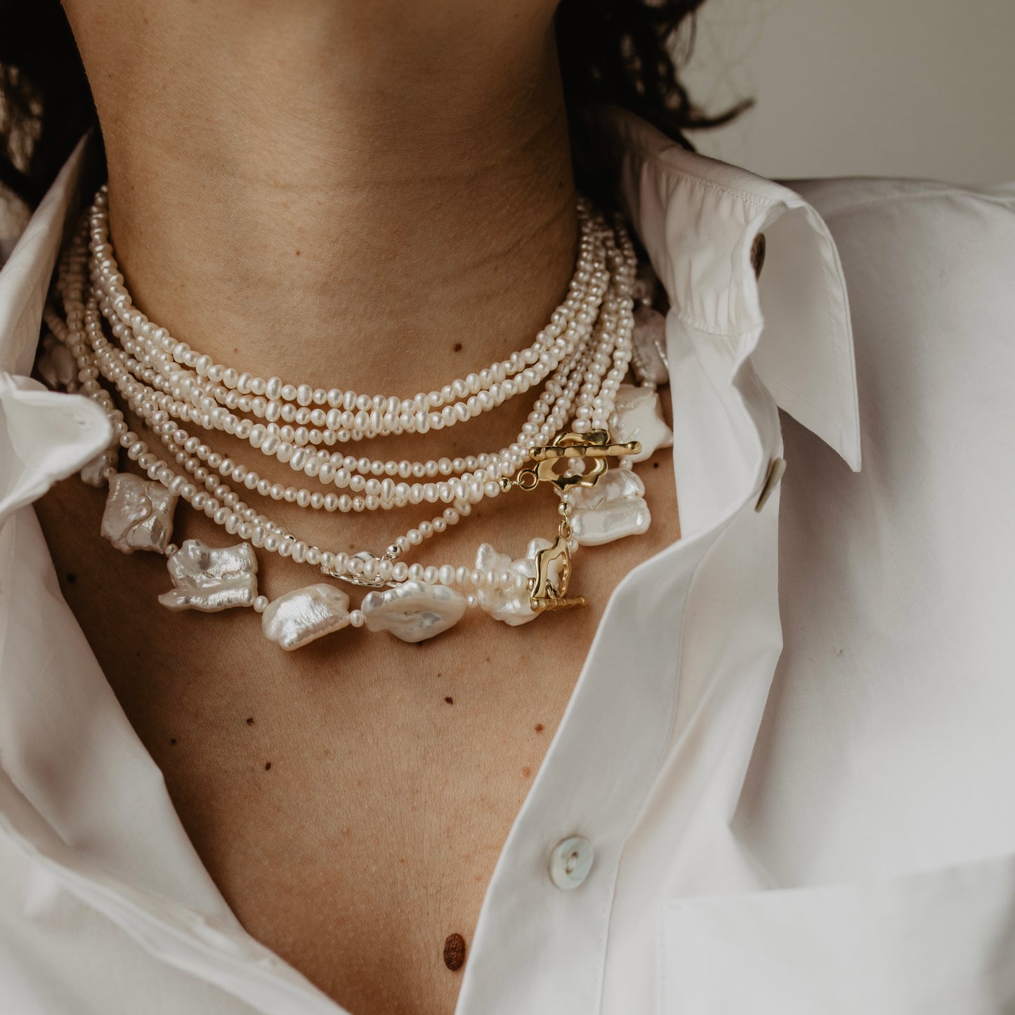 Dubbele Parelketting met 14k vergulde organische vorm sluiting