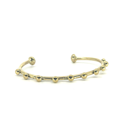 Half ronde messing armband met balletjes