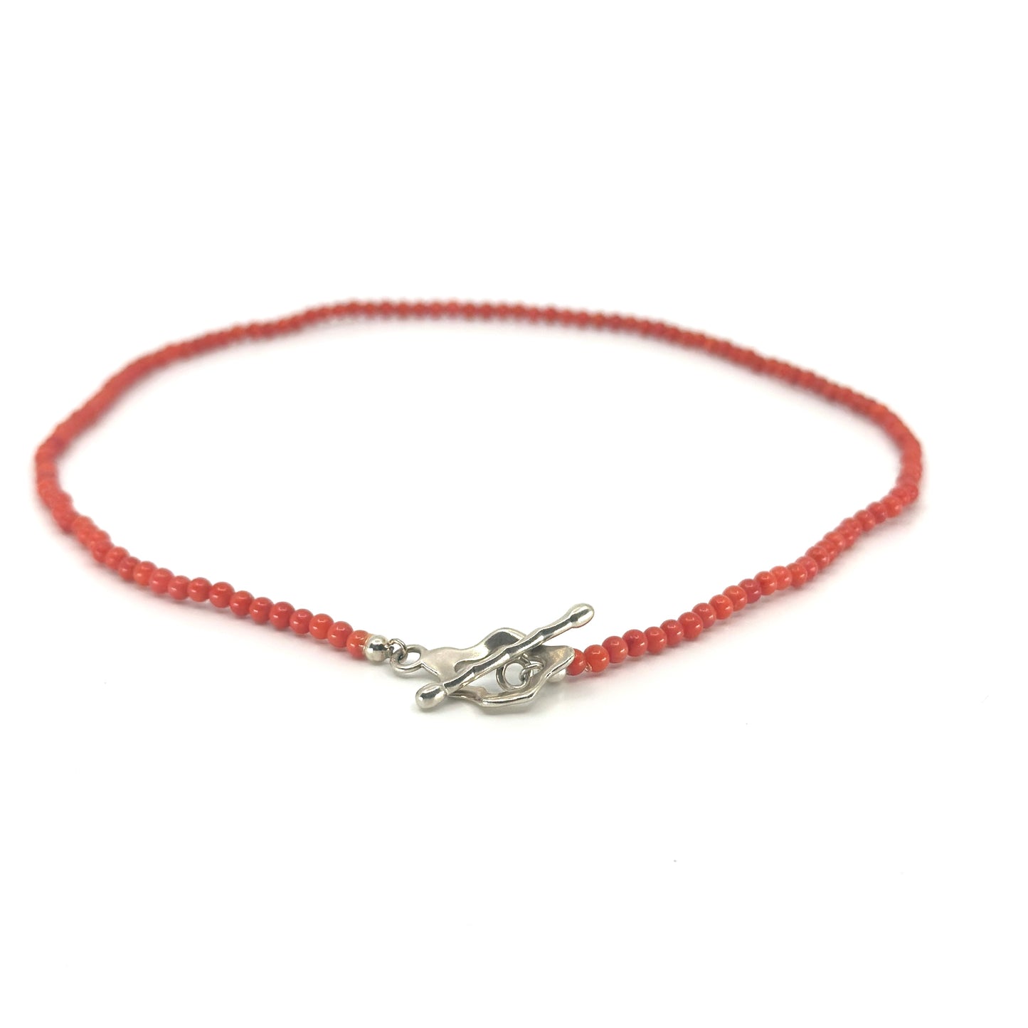 Korte koraal ketting met zilveren sluiting