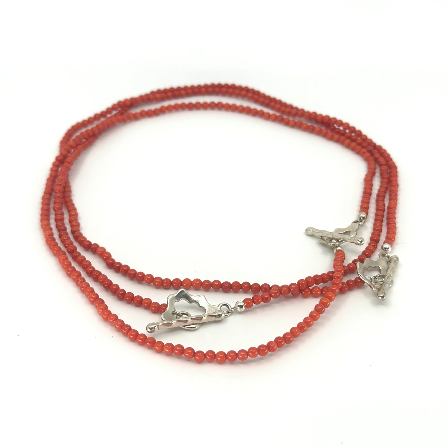 Korte koraal ketting met zilveren sluiting